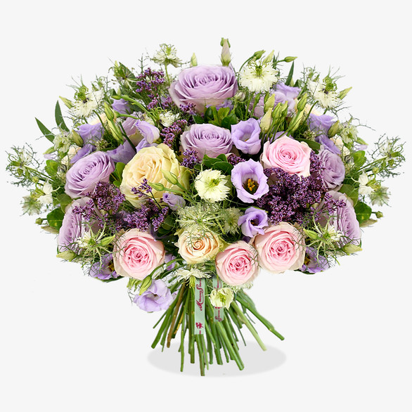 A magical, pastel palette encapsulates this charming design; with roses and lisianthus taking pride of place